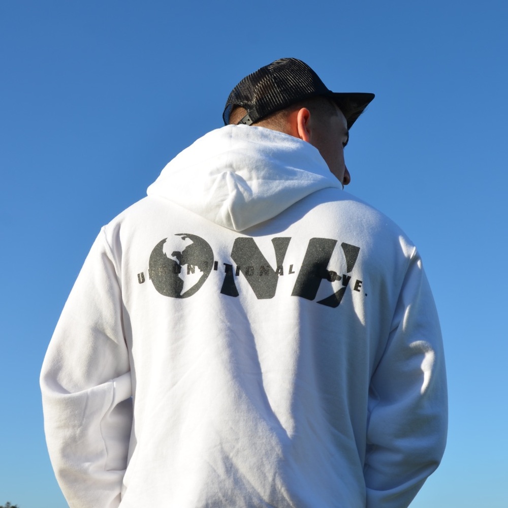 White “Unconditional Love” hoodie.